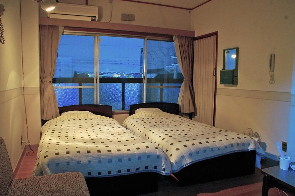 Hotel Yamabe Tenri Zimmer foto